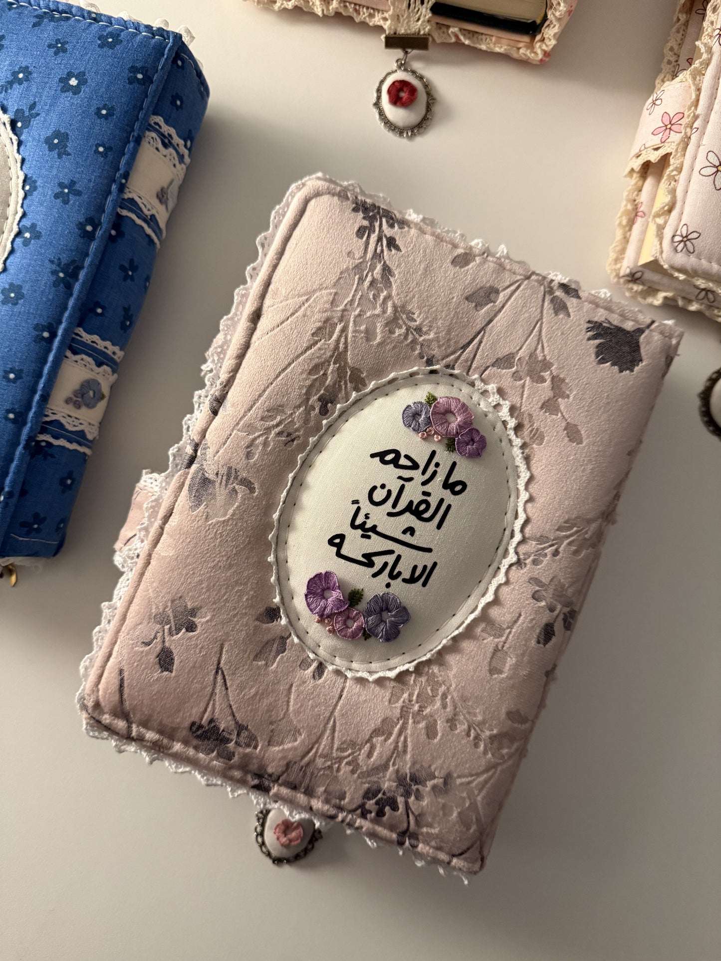 purple floral hardcover Qurān cover