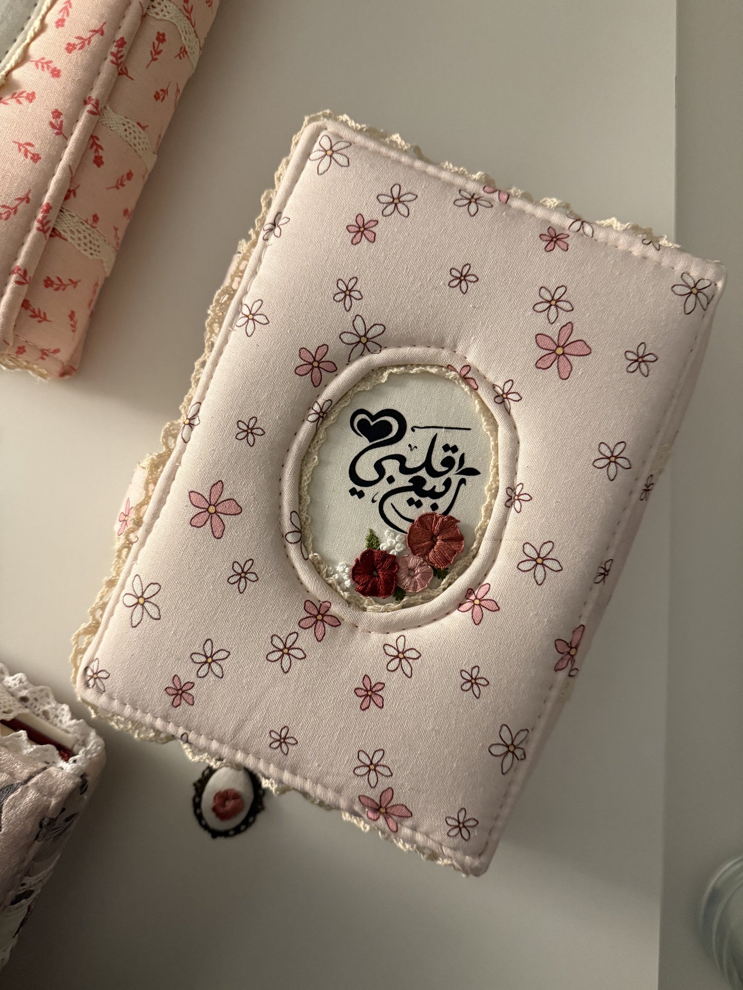 light pink floral hardcover Qurān cover