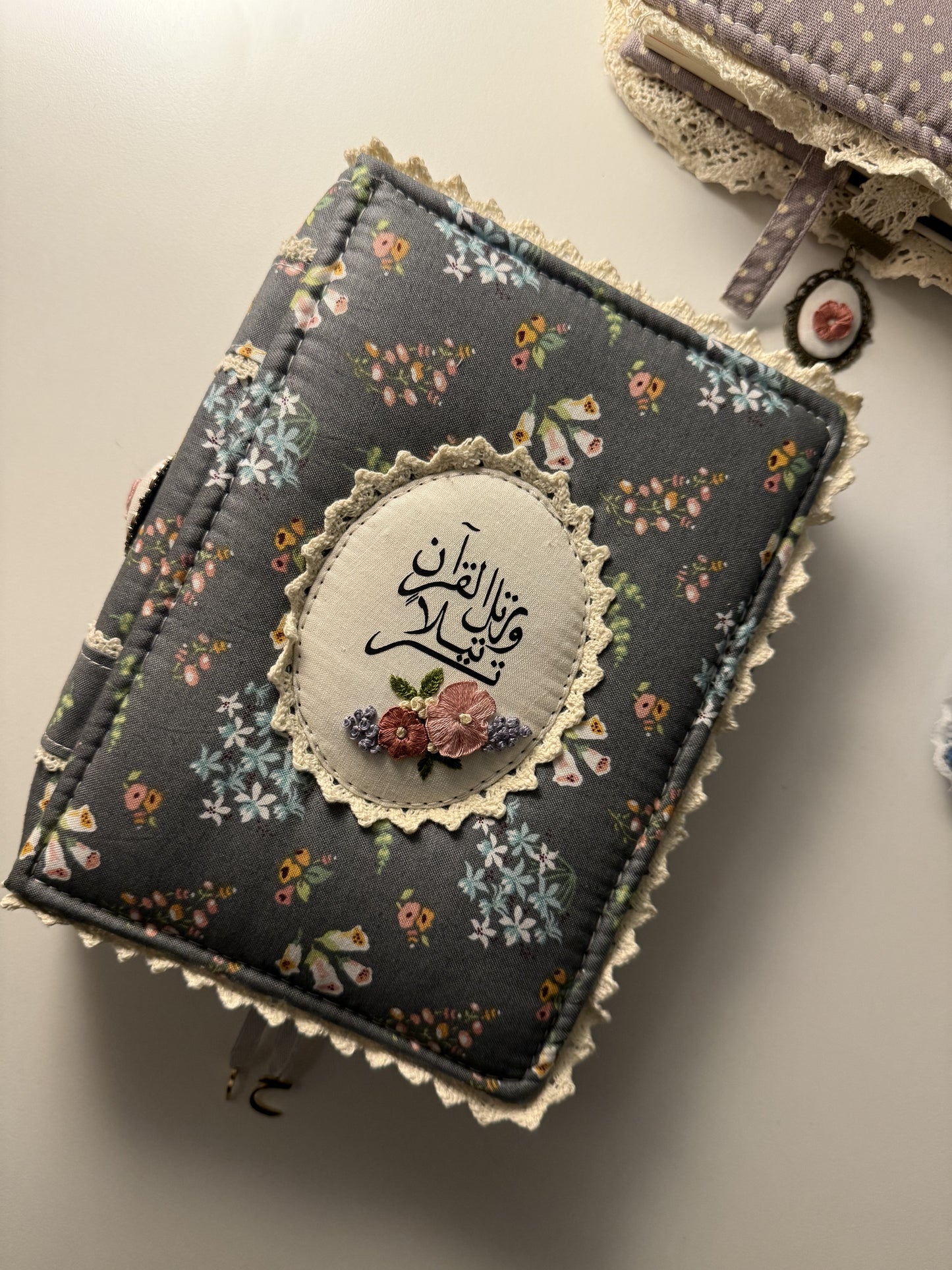 dark floral hardcover Qurān cover