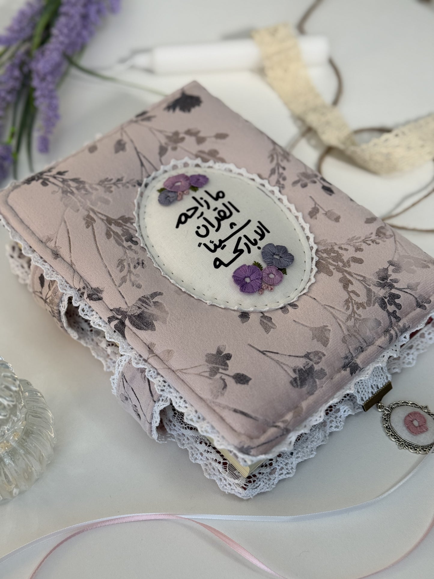 purple floral hardcover Qurān cover