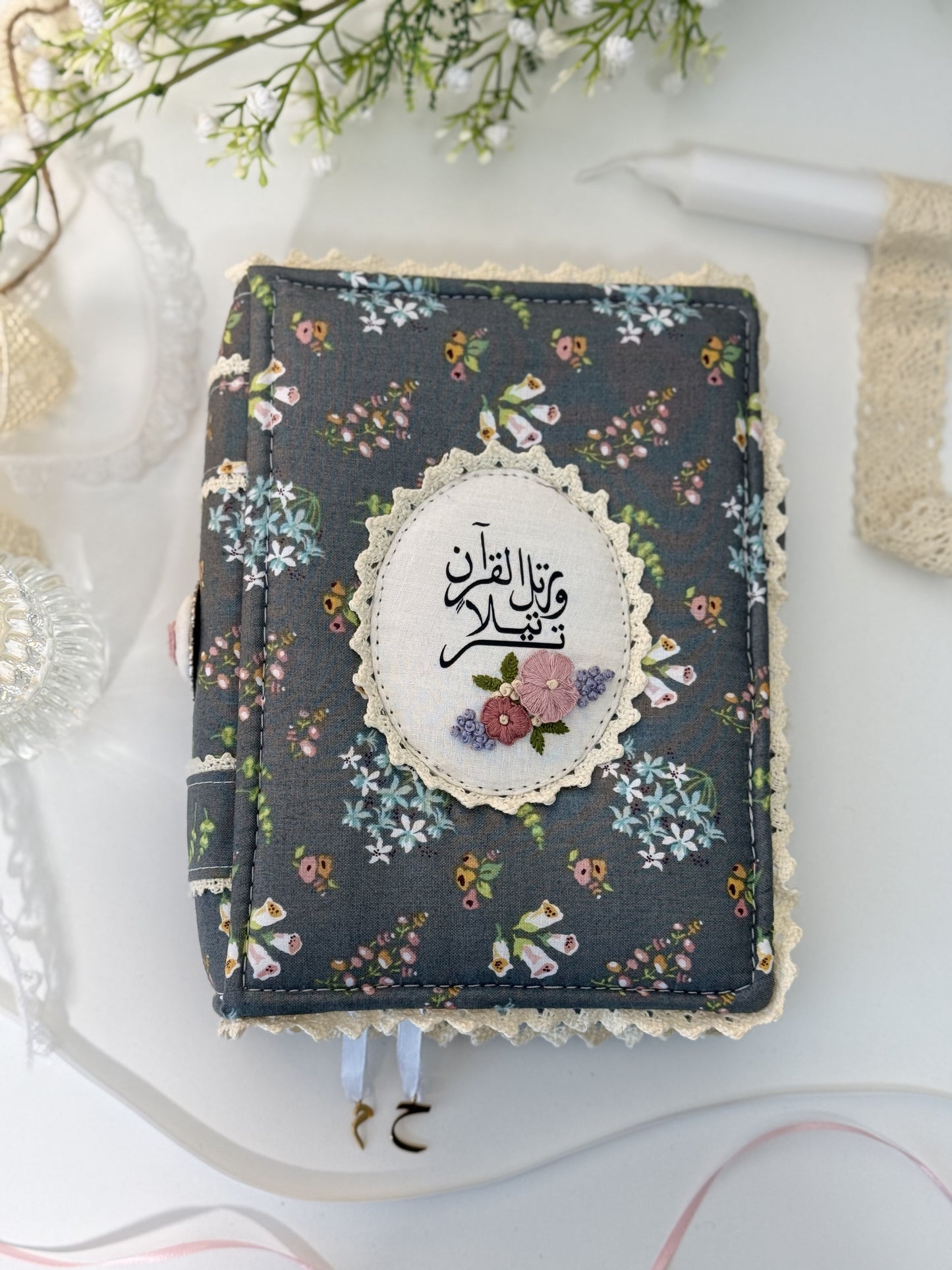 dark floral hardcover Qurān cover
