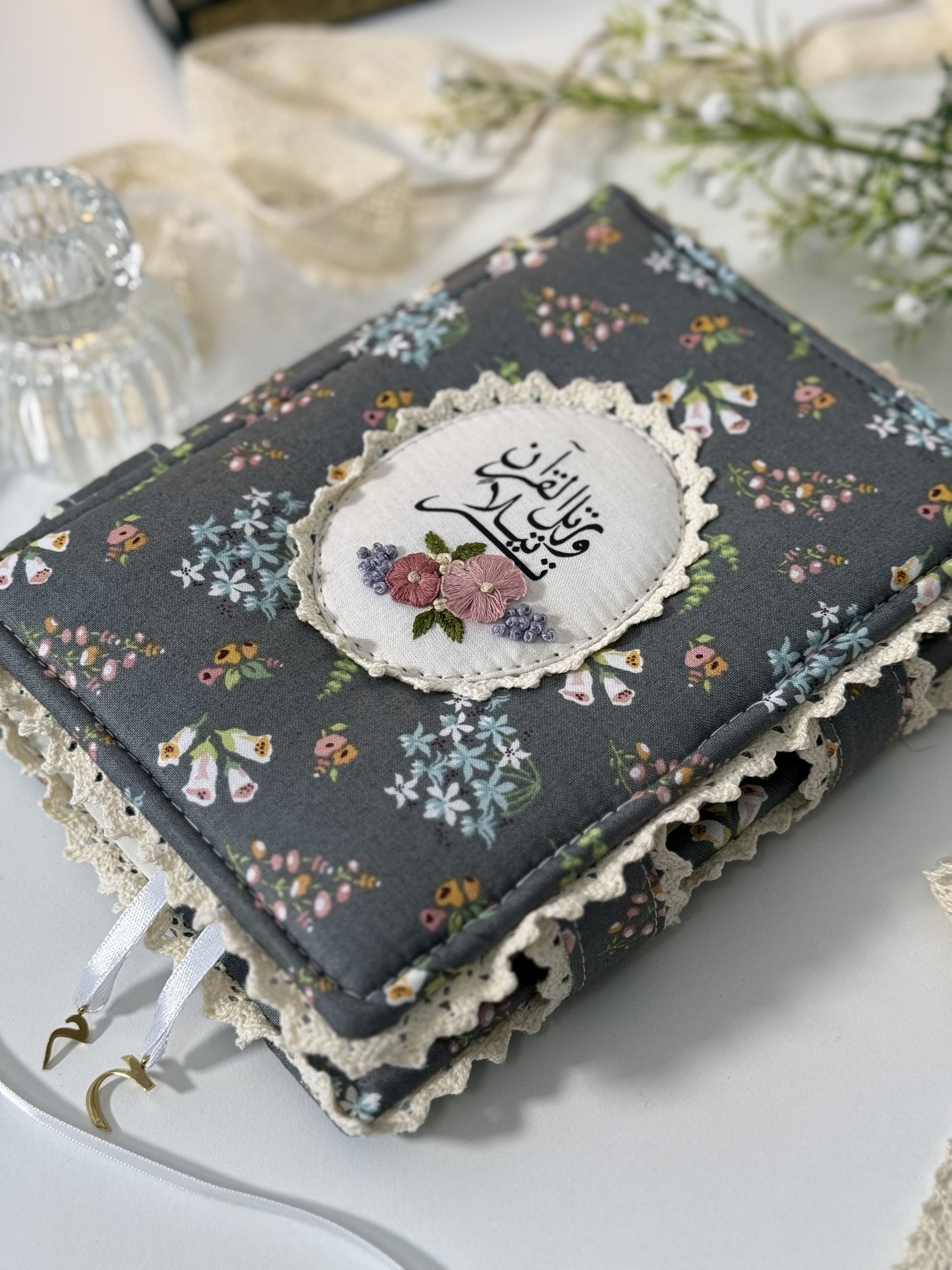 dark floral hardcover Qurān cover
