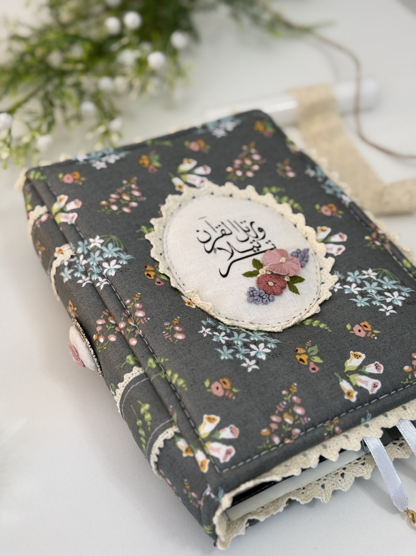 dark floral hardcover Qurān cover