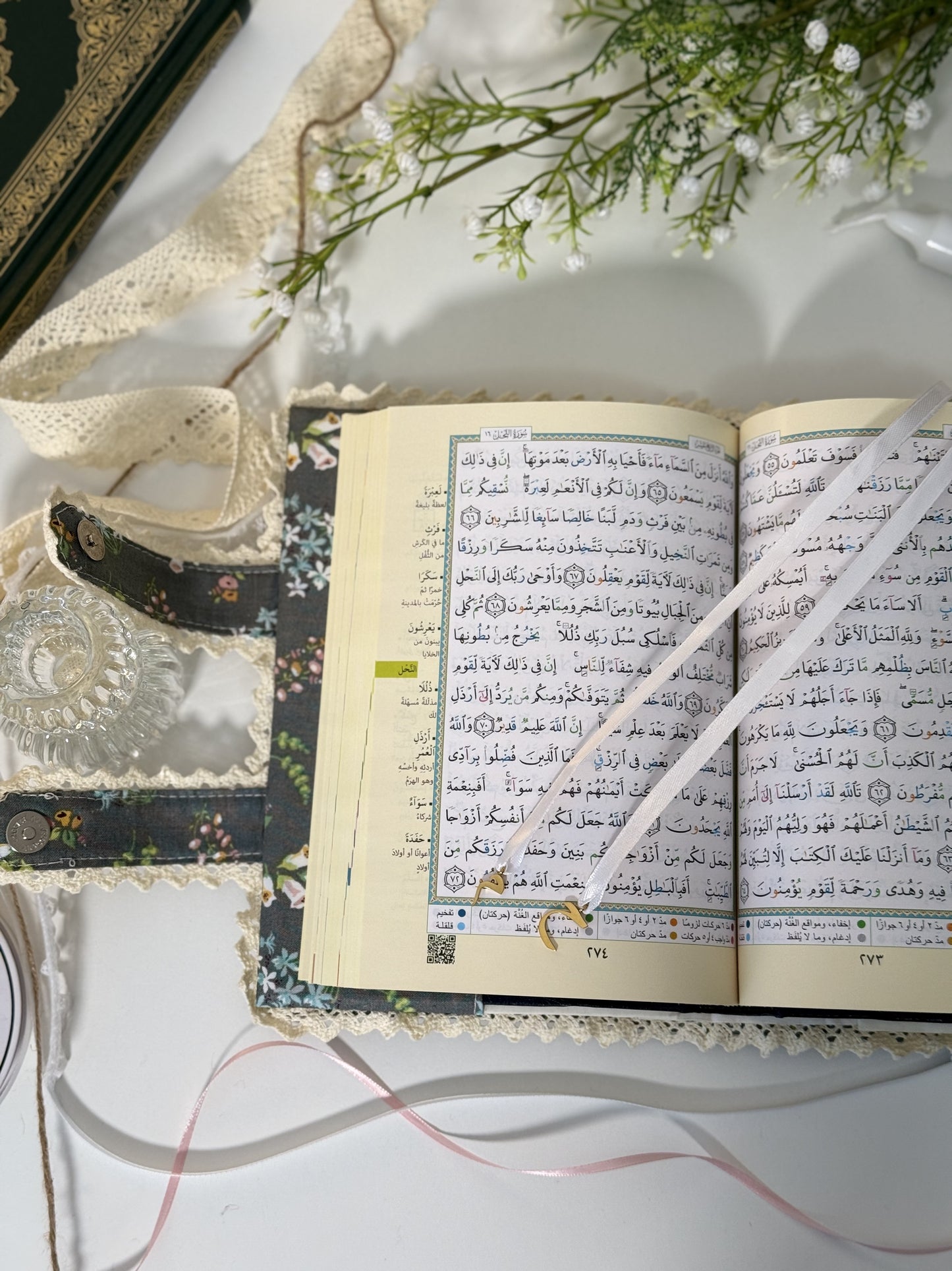 dark floral hardcover Qurān cover