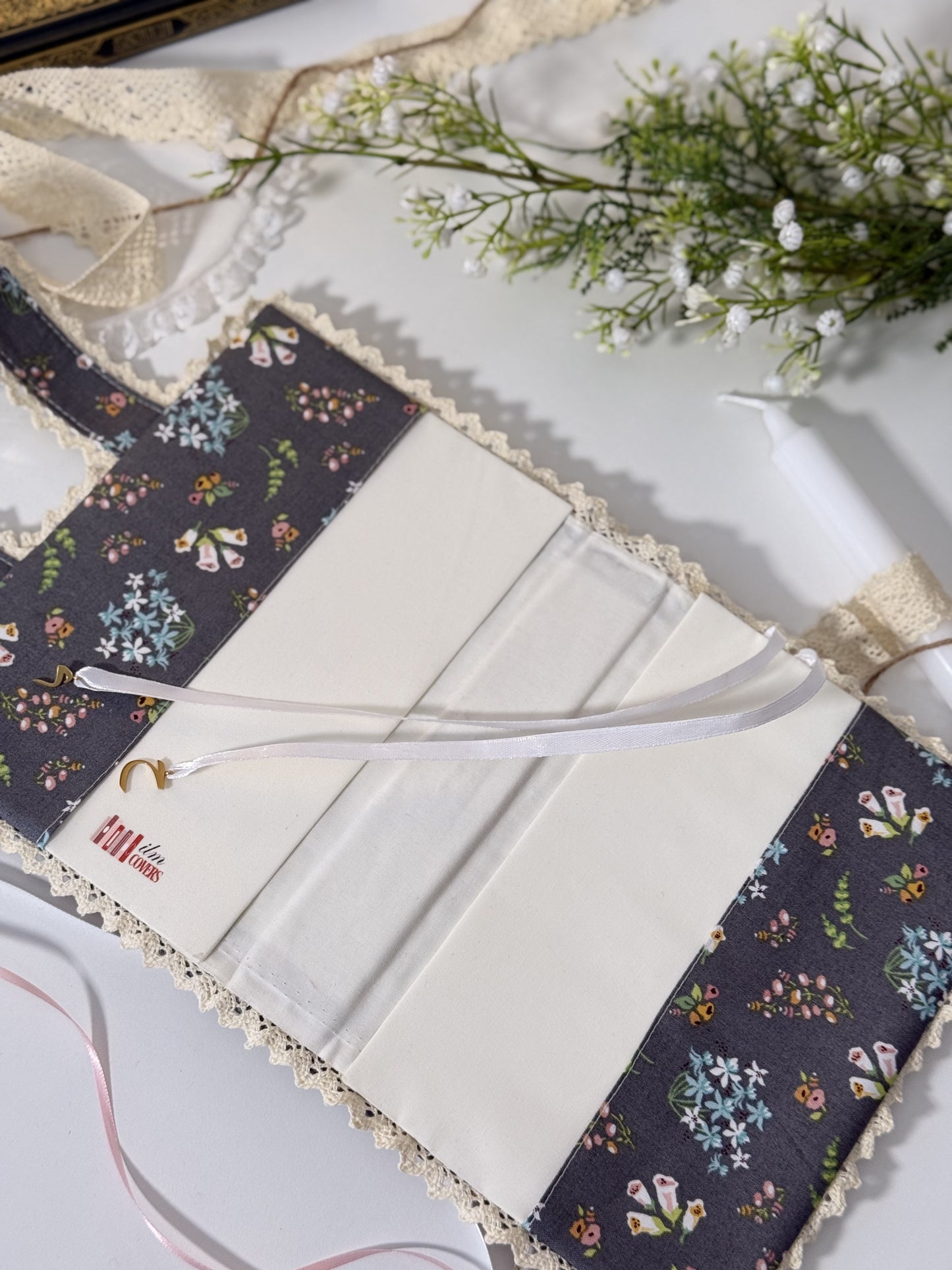 dark floral hardcover Qurān cover